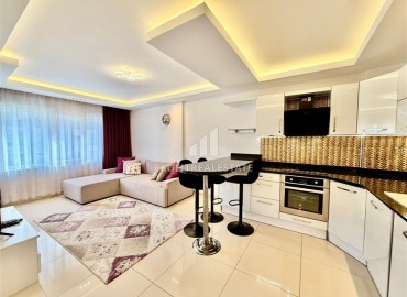 Укомплектованные апартаменты 1+1, 66м², в элитной резиденции в 300м от моря в районе Махмутлар, Алания ID-19024 фото-4