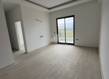 Двухкомнатная квартира, 55м², в новостройке с обширной инфраструктурой в Махмутларе, Алания ID-19026 фото-3