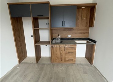 Двухкомнатная квартира, 55м², в новостройке с обширной инфраструктурой в Махмутларе, Алания ID-19026 фото-4