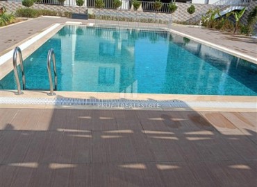 Двухкомнатная квартира, 55м², в новостройке с обширной инфраструктурой в Махмутларе, Алания ID-19026 фото-10