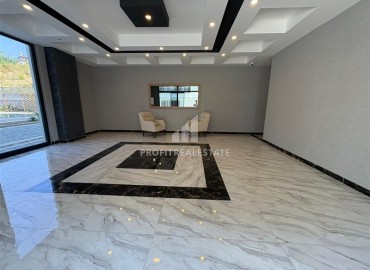 Двухкомнатная квартира, 55м², в новостройке с обширной инфраструктурой в Махмутларе, Алания ID-19026 фото-12