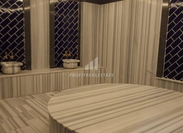 Двухкомнатная квартира, 55м², в новостройке с обширной инфраструктурой в Махмутларе, Алания ID-19026 фото-15