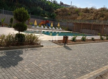 Двухкомнатная квартира, 55м², в новостройке с обширной инфраструктурой в Махмутларе, Алания ID-19026 фото-18