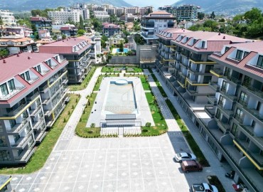 Апартаменты с одной спальней, 57м², в новостройке премиум класса с отличной локацией в районе Кестель, Алания ID-19029 фото-1