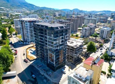 Двухкомнатная квартира, 45м², в комфортабельной новостройке с инфраструктурой в Махмутларе, Алания, в 450м от моря ID-19031 фото-1