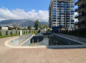 Двухкомнатная квартира, 45м², в комфортабельной новостройке с инфраструктурой в Махмутларе, Алания, в 450м от моря ID-19031 фото-14