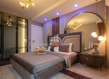 Видовая дизайнерская квартира 1+1, 55м², в элитном комплексе на первой береговой линии в Махмутларе, Алания ID-19032 фото-7