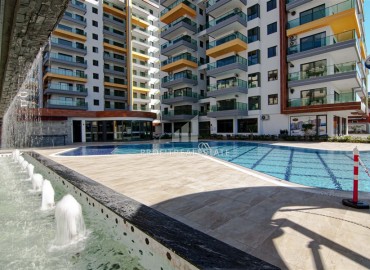 Видовая дизайнерская квартира 1+1, 55м², в элитном комплексе на первой береговой линии в Махмутларе, Алания ID-19032 фото-18