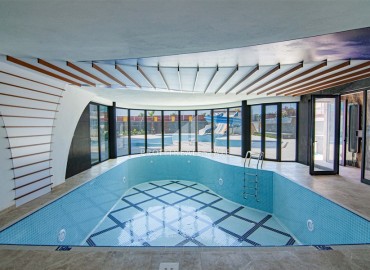 Видовая дизайнерская квартира 1+1, 55м², в элитном комплексе на первой береговой линии в Махмутларе, Алания ID-19032 фото-19