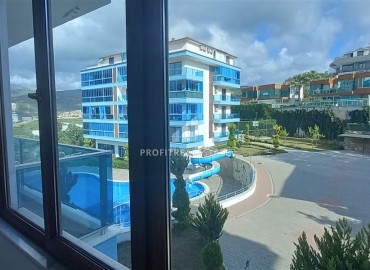 Видовые двухкомнатные апартаменты, 56м², в комплексе премиум класса в горах района Каргыджак, Алания ID-19033 фото-9