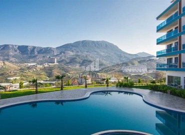 Видовые двухкомнатные апартаменты, 56м², в комплексе премиум класса в горах района Каргыджак, Алания ID-19033 фото-16