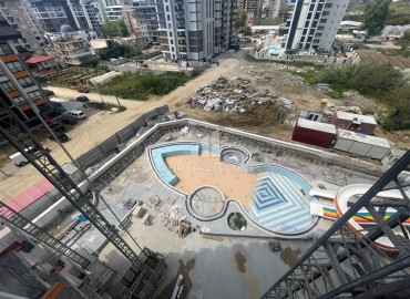Двухкомнатные апартаменты, 51,3м², в элитном комплексе на этапе строительства, в Махмутларе, Алания ID-17654 фото-9