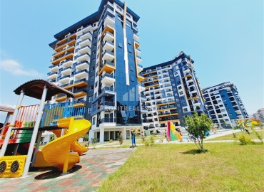 Двухкомнатная квартира со стильным интерьером, 60м², в новостройке с отельной инфраструктурой в Махмутларе, Алания ID-19039 фото-1