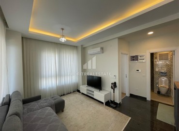 Двухкомнатная квартира со стильным интерьером, 60м², в новостройке с отельной инфраструктурой в Махмутларе, Алания ID-19039 фото-2