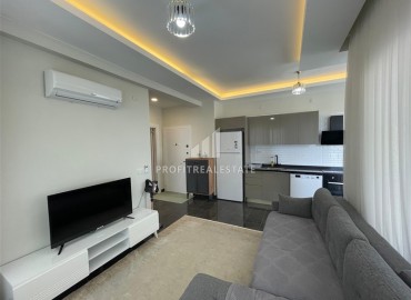 Двухкомнатная квартира со стильным интерьером, 60м², в новостройке с отельной инфраструктурой в Махмутларе, Алания ID-19039 фото-3