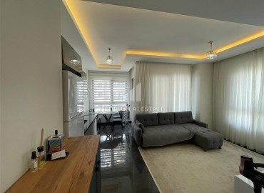 Двухкомнатная квартира со стильным интерьером, 60м², в новостройке с отельной инфраструктурой в Махмутларе, Алания ID-19039 фото-5