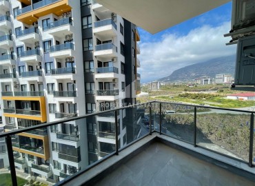 Двухкомнатная квартира со стильным интерьером, 60м², в новостройке с отельной инфраструктурой в Махмутларе, Алания ID-19039 фото-9