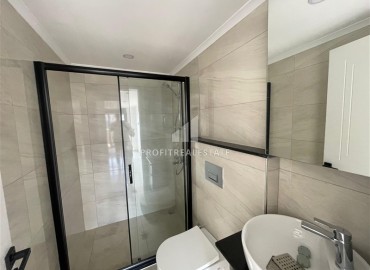 Новая двухуровневая квартира 3+1, 105м², в комплексе премиум класса в центре Махмутлара, в 400м от моря, Алания ID-19042 фото-9