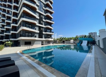 Новая двухуровневая квартира 3+1, 105м², в комплексе премиум класса в центре Махмутлара, в 400м от моря, Алания ID-19042 фото-32