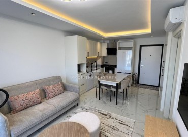 Двухкомнатная квартира 65.5 м², в новом комплексе премиум класса в центре Алании. ID-19038 фото-1