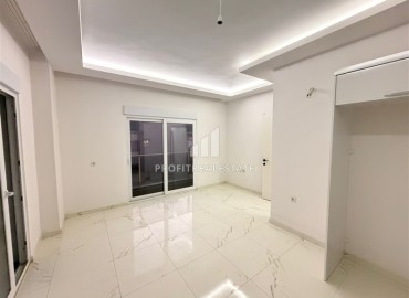 Апартаменты с двумя спальнями, 80м², в новостройке с бассейном на центральной улице Махмутлара, Алания ID-19045 фото-3