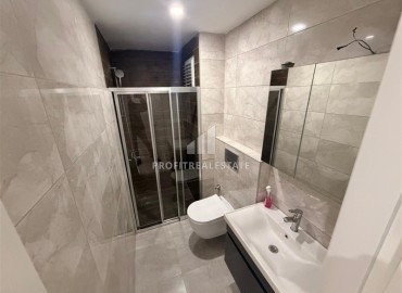 Апартаменты с двумя спальнями, 80м², в новостройке с бассейном на центральной улице Махмутлара, Алания ID-19045 фото-6