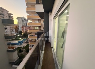 Апартаменты с двумя спальнями, 80м², в новостройке с бассейном на центральной улице Махмутлара, Алания ID-19045 фото-11