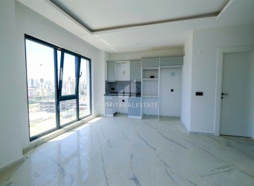 Двухкомнатные апартаменты, 50м², в новом комплексе премиум класса в центре Махмутлара, Алания ID-19047 фото-2