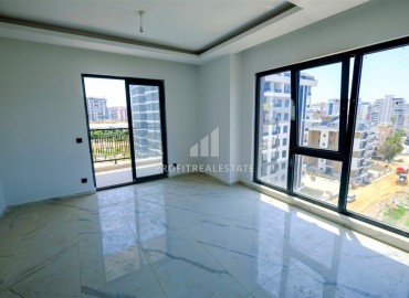 Двухкомнатные апартаменты, 50м², в новом комплексе премиум класса в центре Махмутлара, Алания ID-19047 фото-3