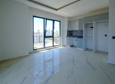 Двухкомнатные апартаменты, 50м², в новом комплексе премиум класса в центре Махмутлара, Алания ID-19047 фото-5