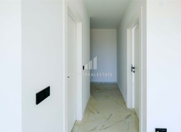 Двухкомнатные апартаменты, 50м², в новом комплексе премиум класса в центре Махмутлара, Алания ID-19047 фото-6