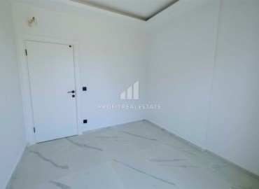 Двухкомнатные апартаменты, 50м², в новом комплексе премиум класса в центре Махмутлара, Алания ID-19047 фото-9