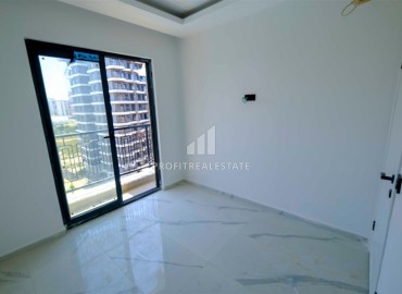 Двухкомнатные апартаменты, 50м², в новом комплексе премиум класса в центре Махмутлара, Алания ID-19047 фото-10