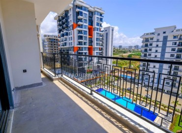 Двухкомнатные апартаменты, 50м², в новом комплексе премиум класса в центре Махмутлара, Алания ID-19047 фото-11