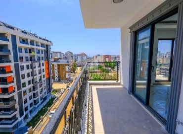 Двухкомнатные апартаменты, 50м², в новом комплексе премиум класса в центре Махмутлара, Алания ID-19047 фото-12