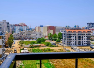 Двухкомнатные апартаменты, 50м², в новом комплексе премиум класса в центре Махмутлара, Алания ID-19047 фото-13