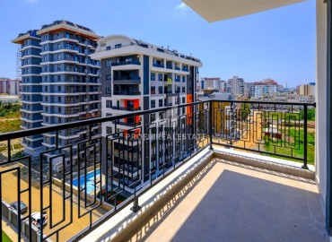 Двухкомнатные апартаменты, 50м², в новом комплексе премиум класса в центре Махмутлара, Алания ID-19047 фото-14