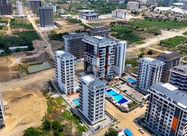 Двухкомнатные апартаменты, 50м², в новом комплексе премиум класса в центре Махмутлара, Алания ID-19047 фото-15