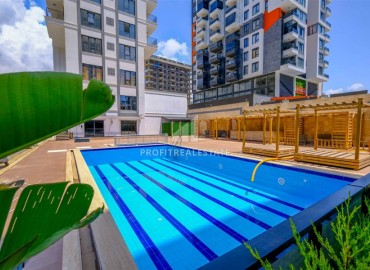 Двухкомнатные апартаменты, 50м², в новом комплексе премиум класса в центре Махмутлара, Алания ID-19047 фото-16