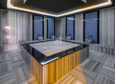 Двухкомнатные апартаменты, 50м², в новом комплексе премиум класса в центре Махмутлара, Алания ID-19047 фото-18