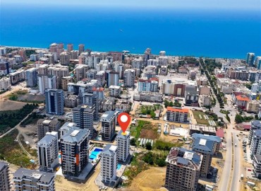 Двухкомнатные апартаменты, 50м², в новом комплексе премиум класса в центре Махмутлара, Алания ID-19047 фото-20