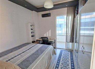 Меблированная двухкомнатная квартира с остекленным балконом, 52м², в 300м от моря в районе Оба, Алания ID-19048 фото-4