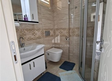 Меблированная двухкомнатная квартира с остекленным балконом, 52м², в 300м от моря в районе Оба, Алания ID-19048 фото-5