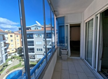 Меблированная двухкомнатная квартира с остекленным балконом, 52м², в 300м от моря в районе Оба, Алания ID-19048 фото-7