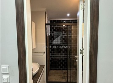 Видовая меблированная квартира с одной спальней, 55м², в элитном комплексе в Махмутларе, Алания ID-19051 фото-7