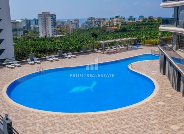 Видовая меблированная квартира с одной спальней, 55м², в элитном комплексе в Махмутларе, Алания ID-19051 фото-17