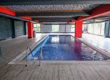 Видовая меблированная квартира с одной спальней, 55м², в элитном комплексе в Махмутларе, Алания ID-19051 фото-18