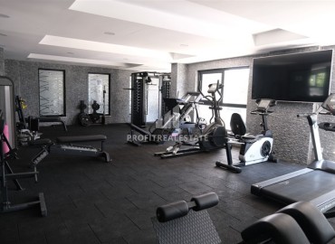 Видовая меблированная квартира с одной спальней, 55м², в элитном комплексе в Махмутларе, Алания ID-19051 фото-19