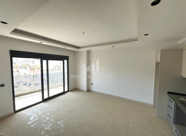 Новые апартаменты с одной спальней, 55м², в элитной резиденции в Махмутларе, Алания, 600м от моря ID-19053 фото-3