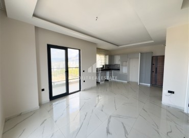 Видовой пентхаус 2+1, 90м², с чистовой отделкой в новом комплексе премиум класса в центре Махмутлара, Алания ID-19056 фото-2